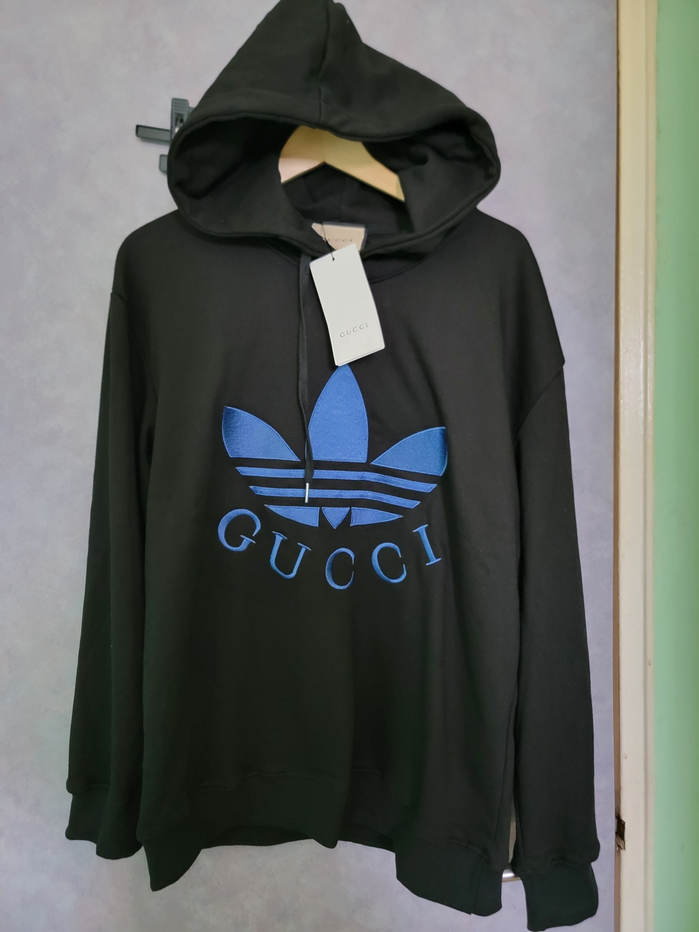 Black Hoodie with Blue Logo